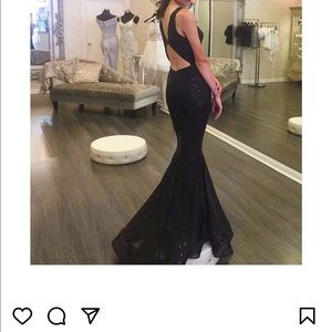 It’s a beautiful gown by Nickole Bakhti